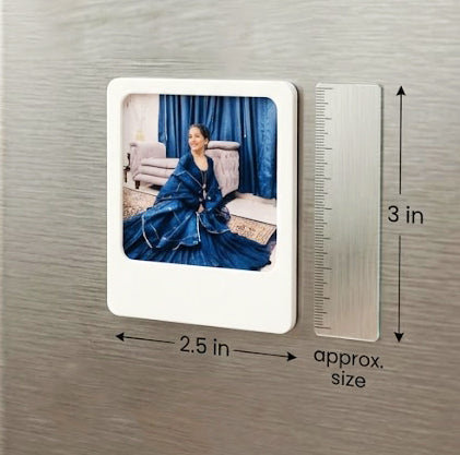 Rectangular photo frame fridge magnetwith a woman in a blue dress, accompanied by a ruler for size reference on a metallic surface, made by Kustomade, India