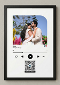 Framed photo of a couple with music player interface and QR code on a wall, made by Kustomade, India